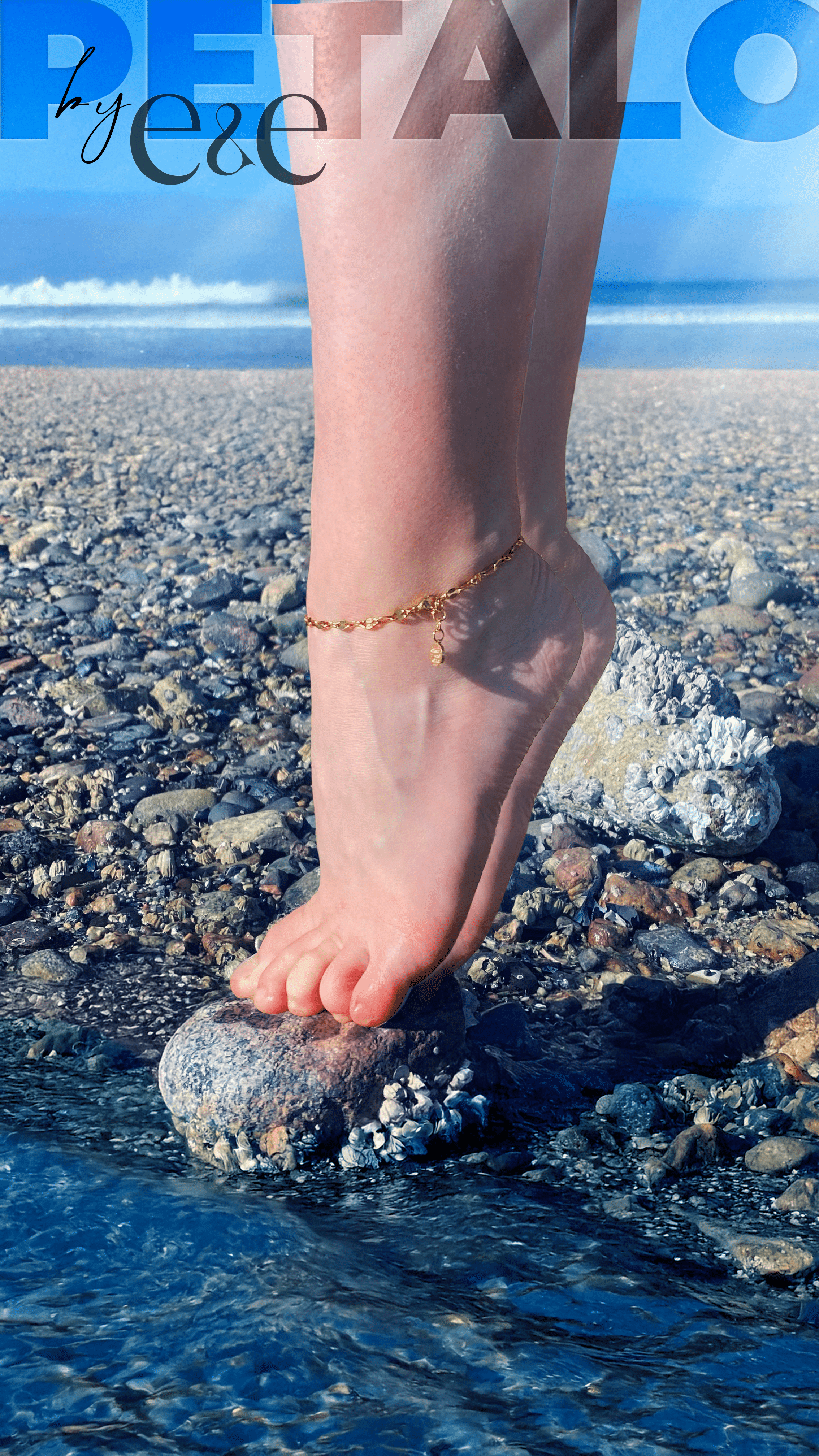 A soft, gold-tone chain with a central CZ stone is shown elegantly resting on skin, styled as both anklet and bracelet. It shimmers as the model moves gently, highlighting the chain’s flexibility and detail.