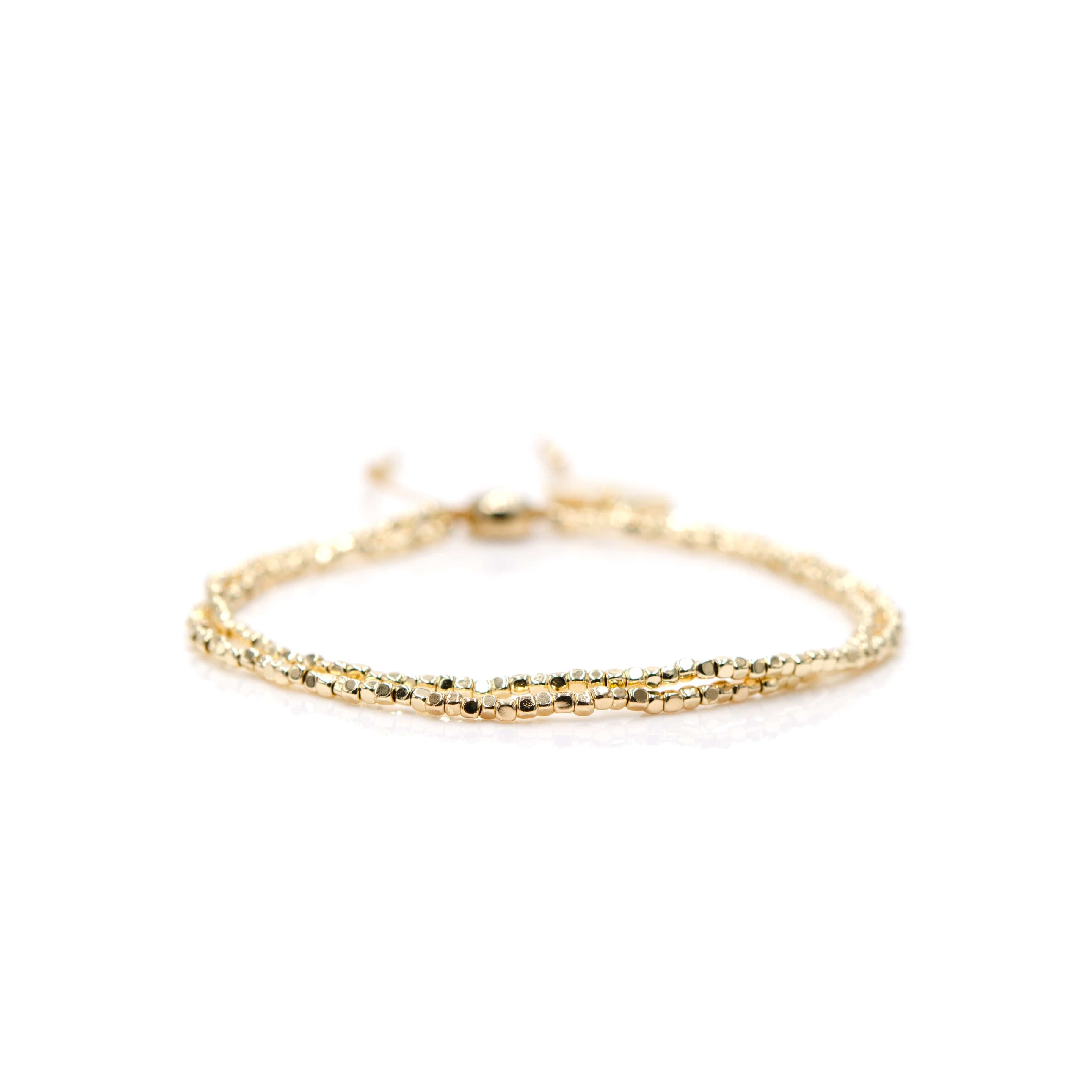 Tiny gold bead on sale bracelet